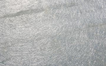 Castle Combe laminate fibreglass or shingles?